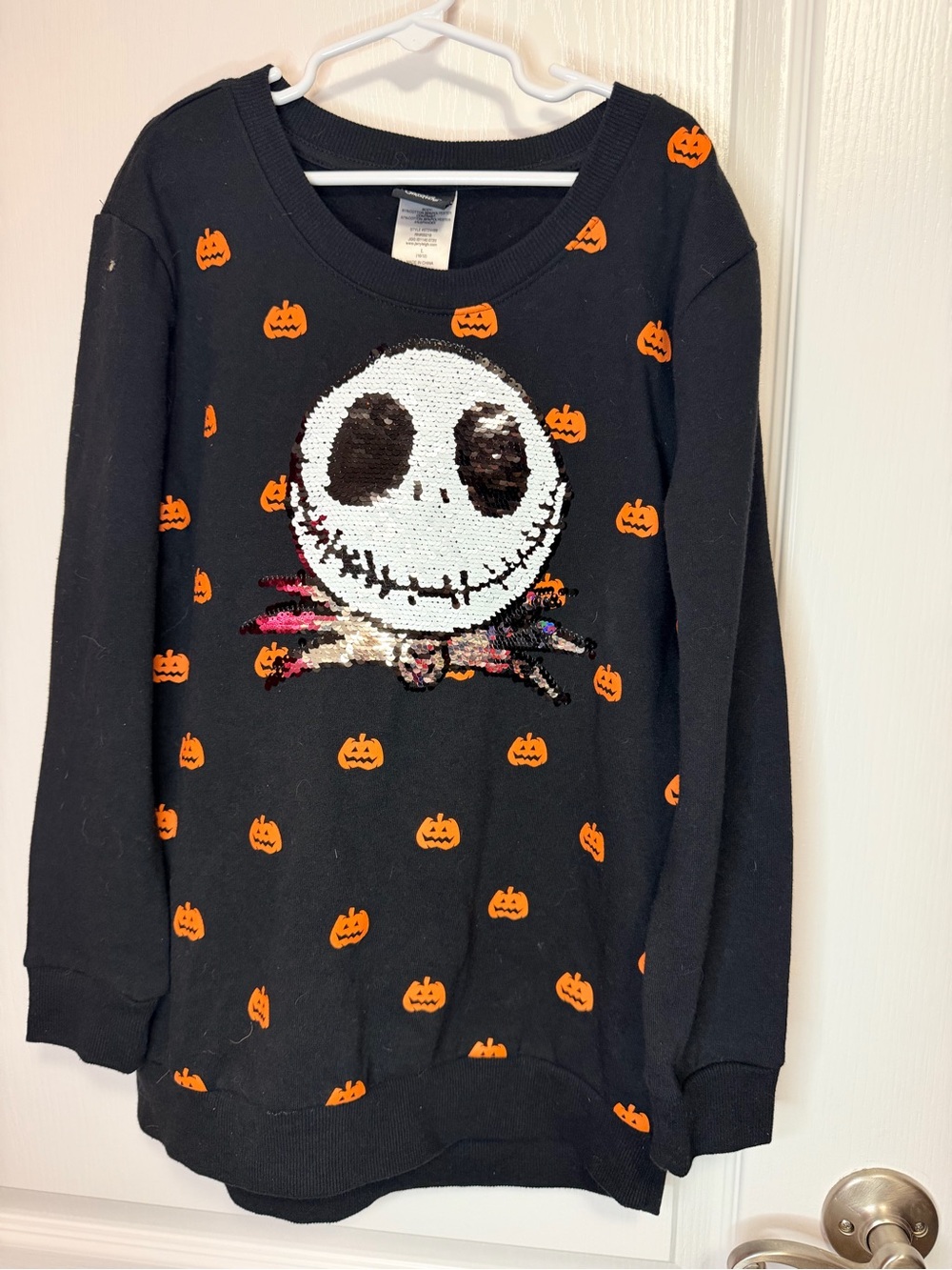 Disney Black Sequin Jack Skellington Sweater with Orange Pumpkins